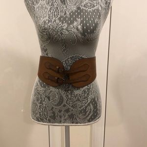 AdjustableTan belt. (Not leather)